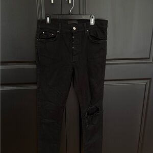 AMIRI Black Skinny Jeans with Distressed Detail